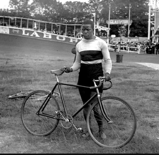 Major Taylor posing with his bike